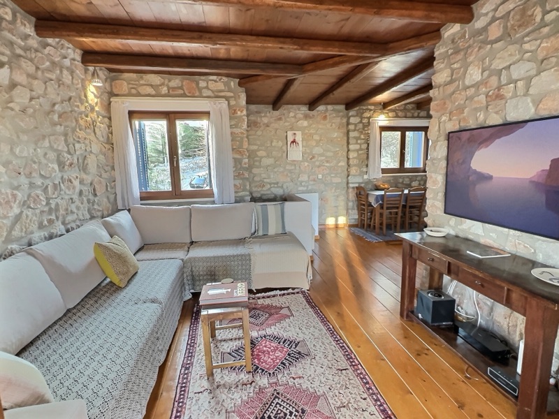 Open living room with doors to the terrace